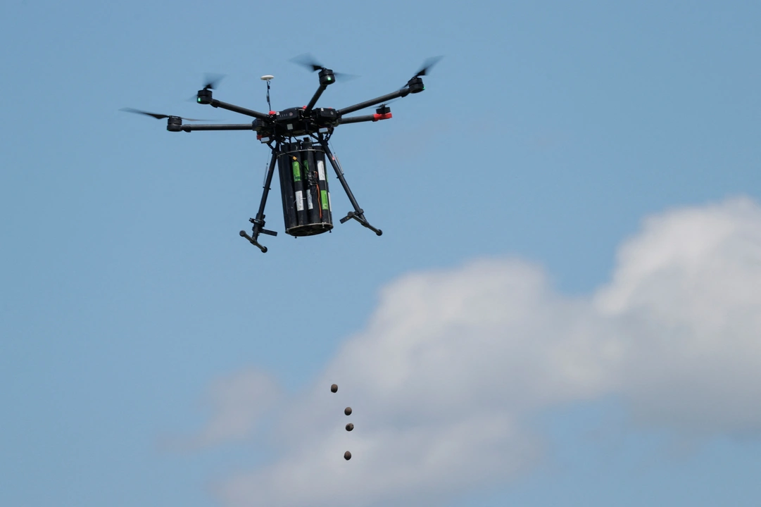 A drone drops seeds over a forested area on the first day of drone reforestation in Butovc, Kosovo May 13, 2024. REUTERS/Valdrin Xhemaj