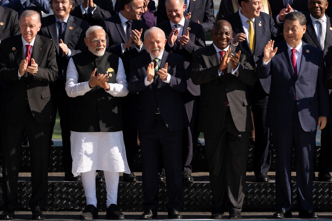Turkish President Tayyip Erdogan, India's Prime Minister Narendra Modi, Brazil's President Luiz Inacio Lula da Silva, Chinese President Xi Jinping, and South Africa's President Cyril Ramaphosa join world leaders for a group photo during the G20 Summit, in Rio de Janeiro, Brazil, November 18, 2024. Manuel Balce Ceneta/Pool via REUTERS